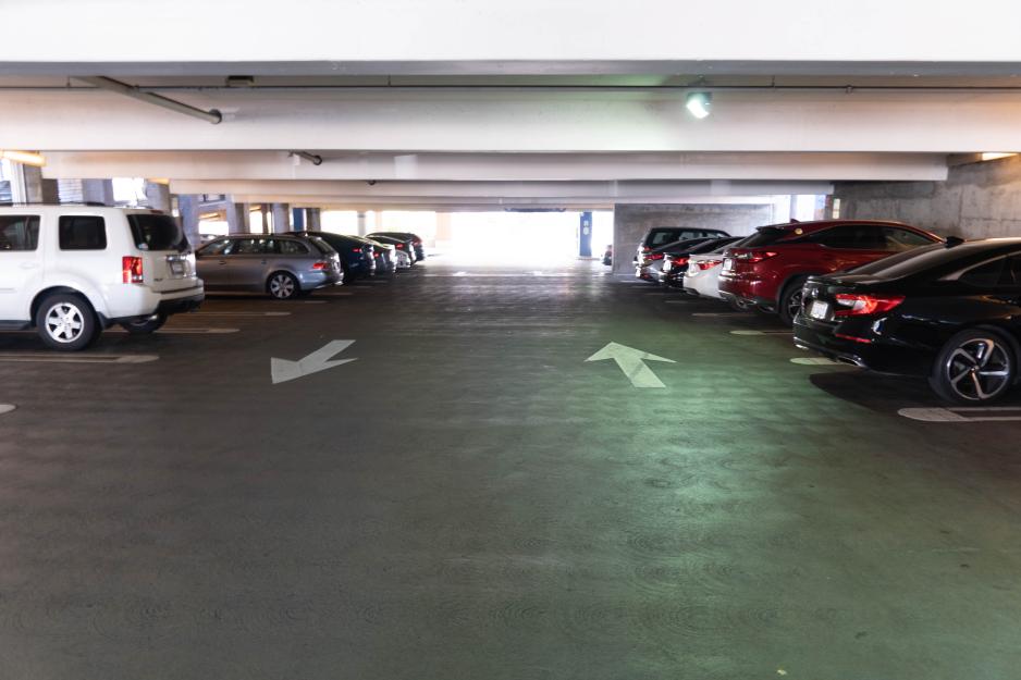 S2-C11.3-G1_ParkingLot_PA Photo of parking garage with cars parked on both sides of the aisle