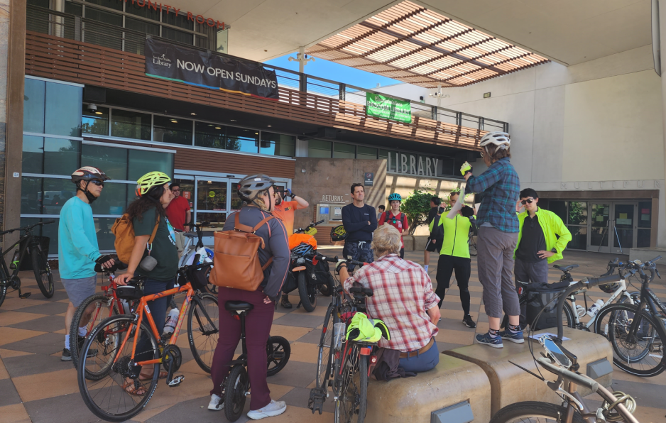 Group discussion in front of Bascom Library about bicycle safety and VTA bike lanes